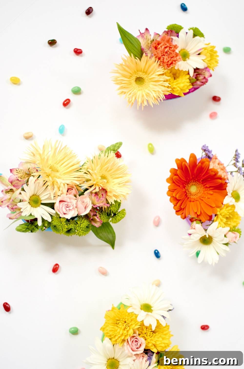 Flowers sitting on a white surface with colorful petals.