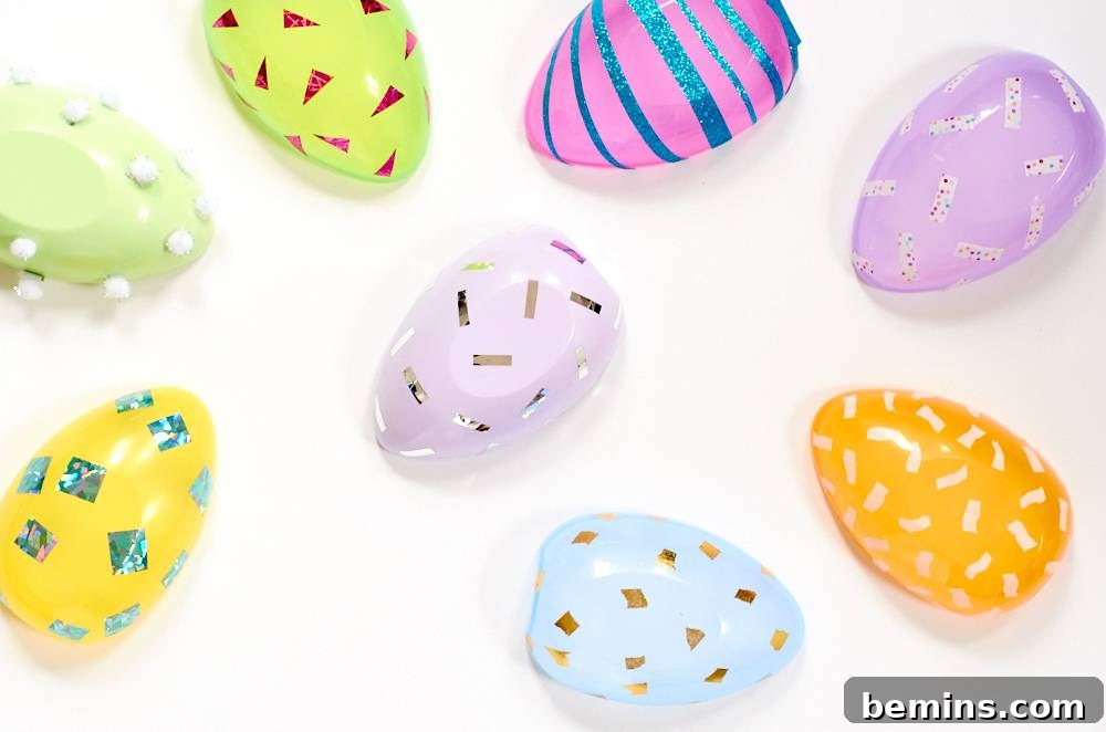 Several decorated plastic Easter eggs with different washi tape designs.