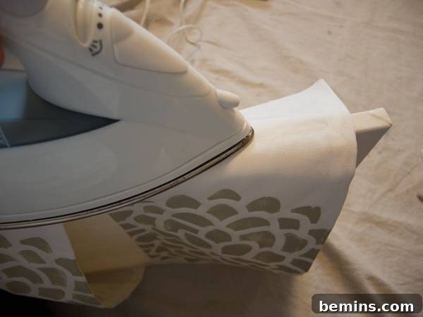 Ironing the sides of the fabric 