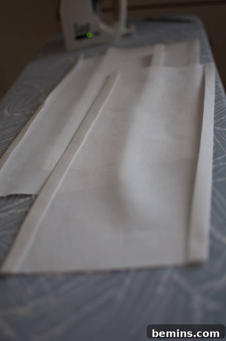 Ironing hems of fabric
