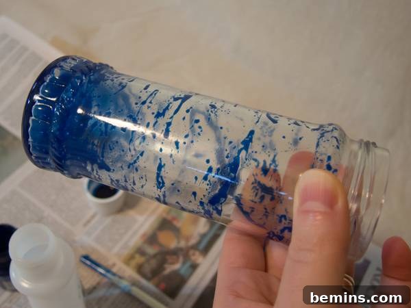 swirling the acetone and paint