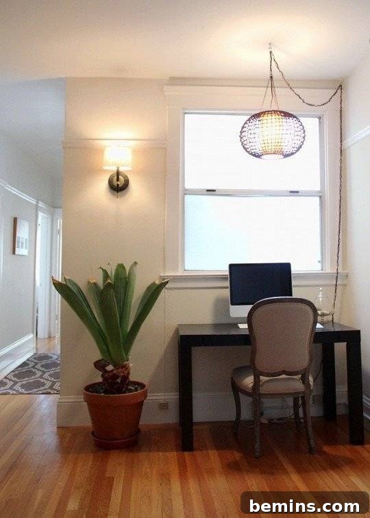 10 Stunning DIY Lighting Ideas No Electrician Required 10 An old light fixture creatively wrapped in a strand of twinkle lights, creating a charming and repurposed decorative accent.