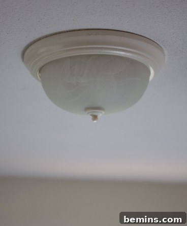 Before: Unsightly ceiling light fixture
