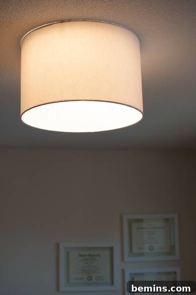 The finished magnetic ceiling light fixture, illuminated.