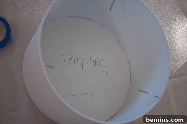 Fitting the poster paper template inside the lampshade