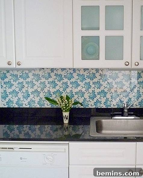 Fabric behind plexiglass as a rental kitchen backsplash