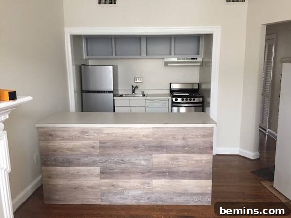 After kitchen cabinet refacing with vinyl flooring - Transformed island with vinyl flooring