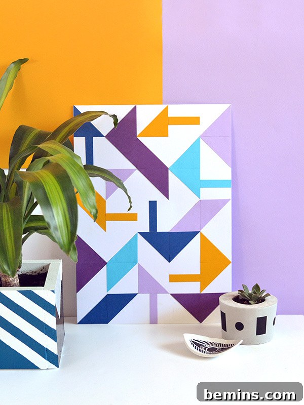 Stunning DIY geometric paper wall art displaying a modern, abstract design in vibrant colors