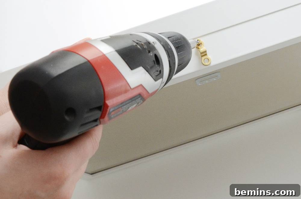 Attaching the hook and staple latch
