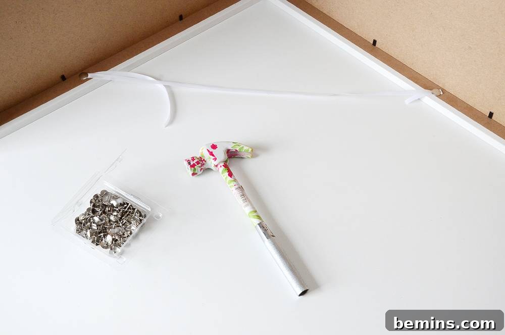 Attaching the ribbon to prevent over-extension of the hinges