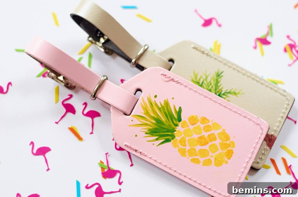 Two leather tags are visible on a flamingo patterned print. These tags are your personal signature when you're on the go.