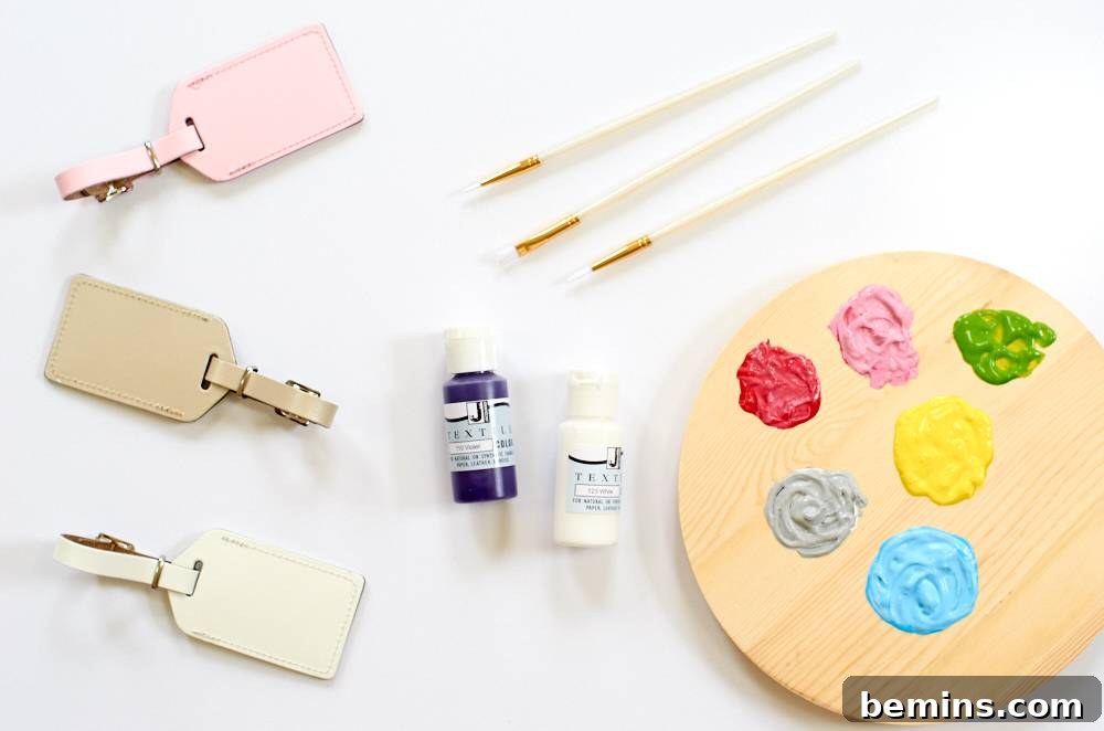 Luggage tags with a palette of paint and paint brushes. Gather your supplies to start creating your own custom leather luggage tags.