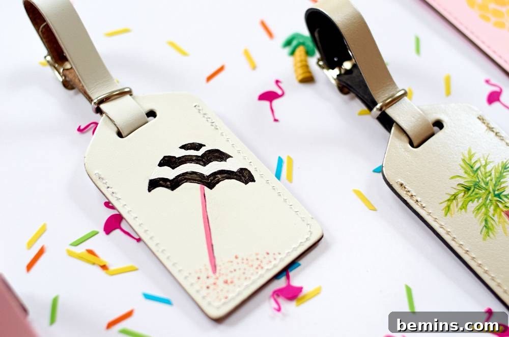 Two decorative tags are laying on a colorful table. Personalized leather luggage tags also make a unique and thoughtful gift for travel lovers.