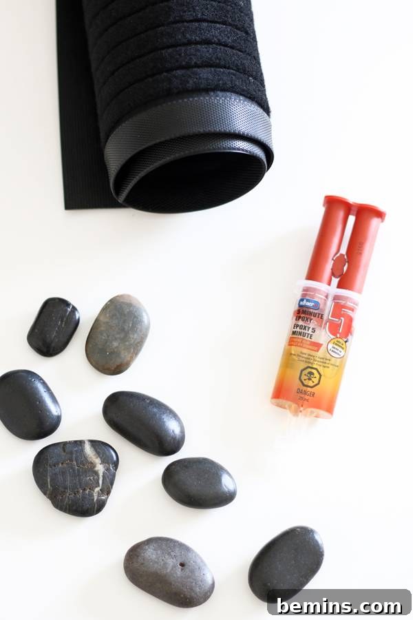 All the materials needed to make a pebble bath mat