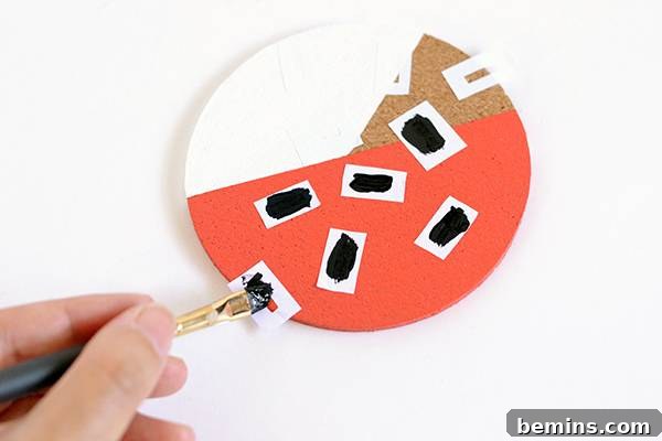 Patterned Cork Coasters: Elevating Your Drink Experience 19 Painting the sprinkles with black paint