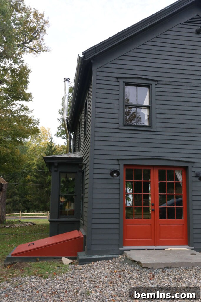 Greenish-Charcoal Exterior with Red Door