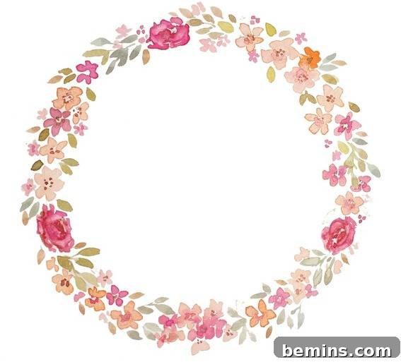 10 Heartfelt Printables: A Free Mother's Day Gift Guide 7 A completed floral wreath printable with personalized text, a thoughtful gift for Mother's Day.
