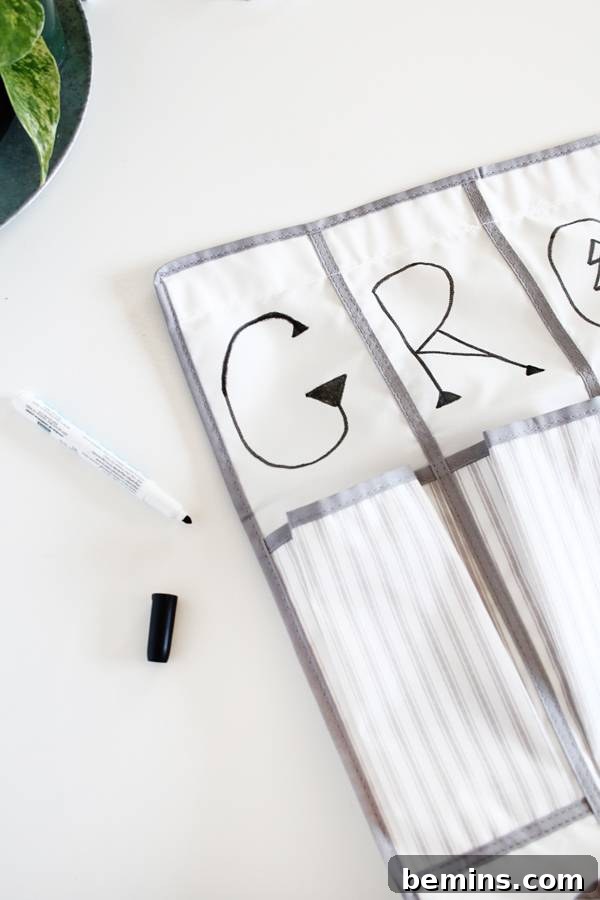 Repurposing a Shoe Organizer as a Vertical Garden 4 Decorating Shoe Organizer with Fabric Marker