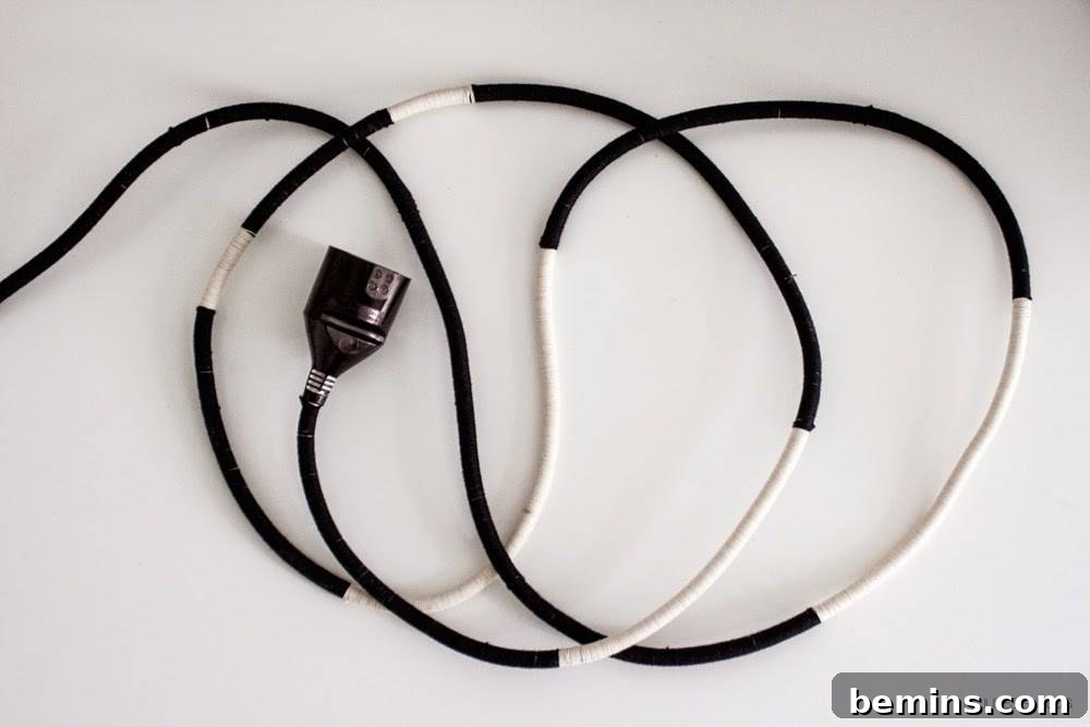 Roundup: 10 Clever Cord Control Ideas for a Tidy Home 5 DIY fabric cord wrap