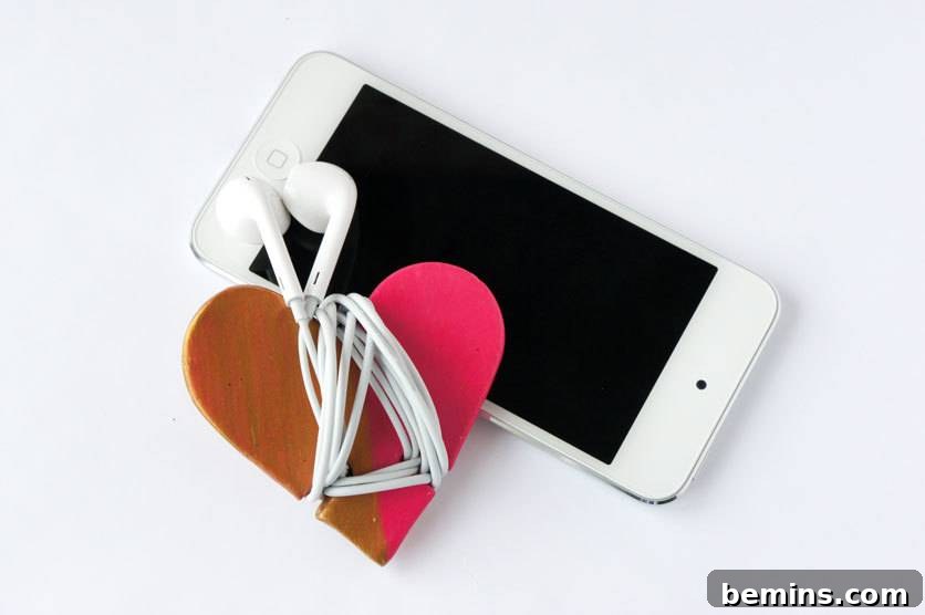 Roundup: 10 Clever Cord Control Ideas for a Tidy Home 8 DIY heart-shaped headphone cord wrap