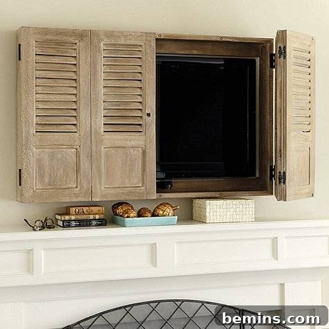 Shutters concealing a TV, offering a charming and classic aesthetic to the room.