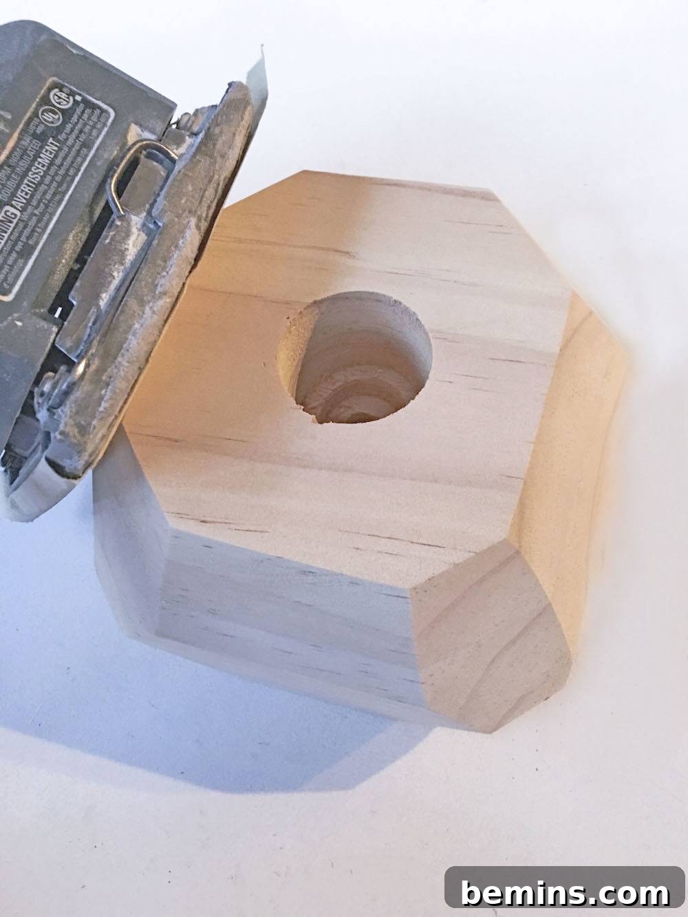 Sanding the wood block