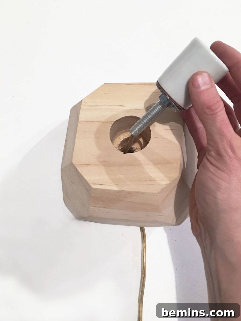 DIY Edison Bulb Wooden Table Lamp 25 Pulling the cord through the lamp pipe