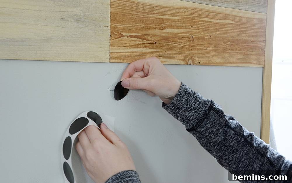Applying Black Stickers to Cover Imperfections