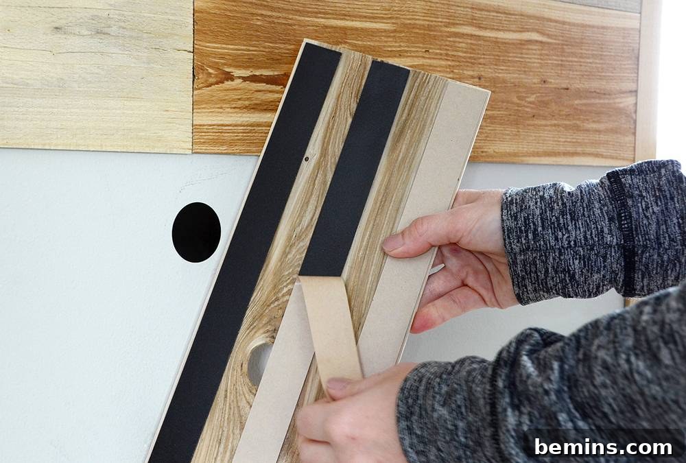 Adhering Reclaimed Wood Planks to the Wall