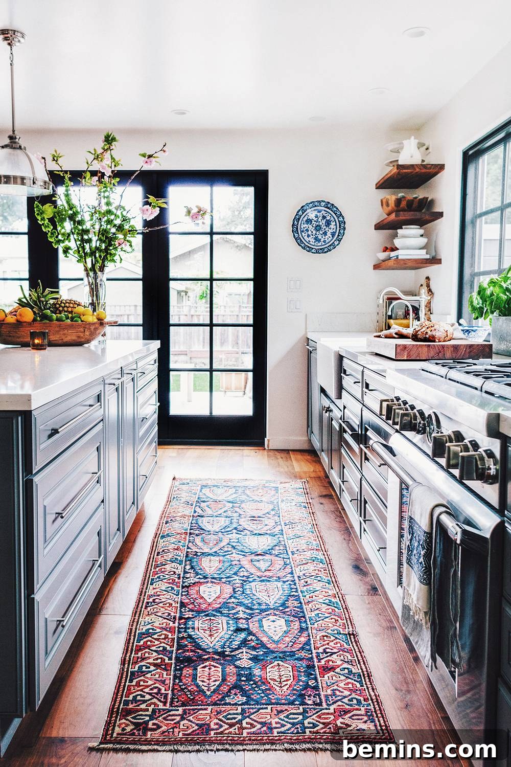 Kitchen featuring a rug and bowls and plates