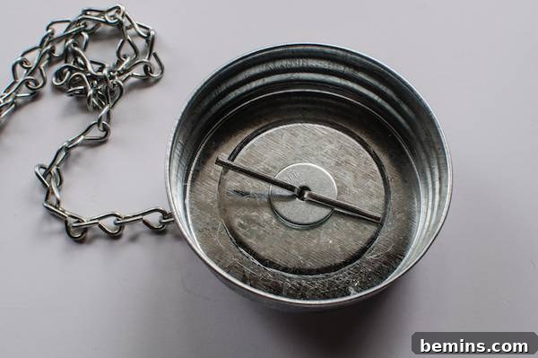 How to Craft a Hanging Air Plant Terrarium from a Mason Jar 5 Securing the Cotter Pin