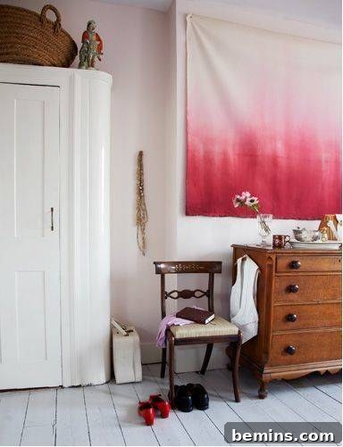 A chair is in front of the Diy large canvas drop cloth wall art. Ombre Wall Hanging Canvas Drop Cloth Wall Art.