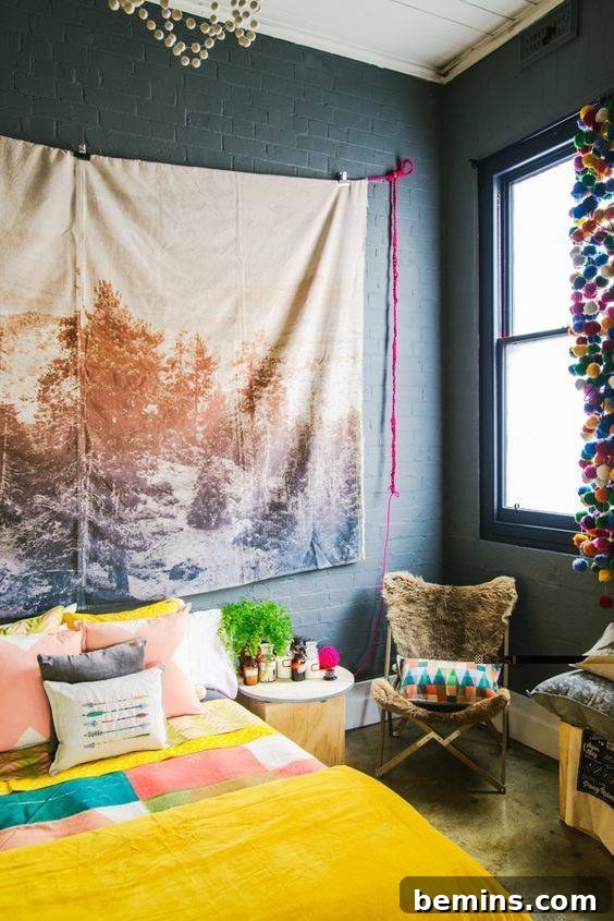 Large canvas drop cloth wall art hanging on a blue wall next to a window. Painted Wall Tapestry Canvas Drop Cloth Art.