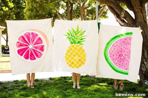 Persons is holding a painted picture of orange, pineapple and watermelon. Hand Painted Picture Canvas Drop Cloth Wall Art.