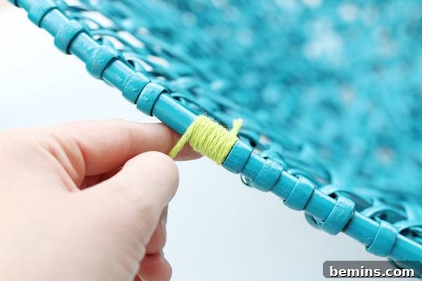 Wrapping Yarn Around the Wicker Chair