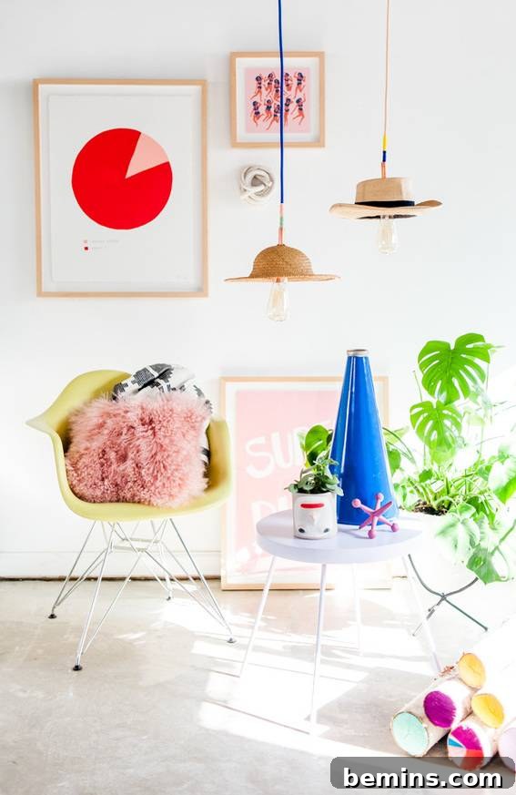 Colorful decorations fill a room with a white table and a yellow chair.