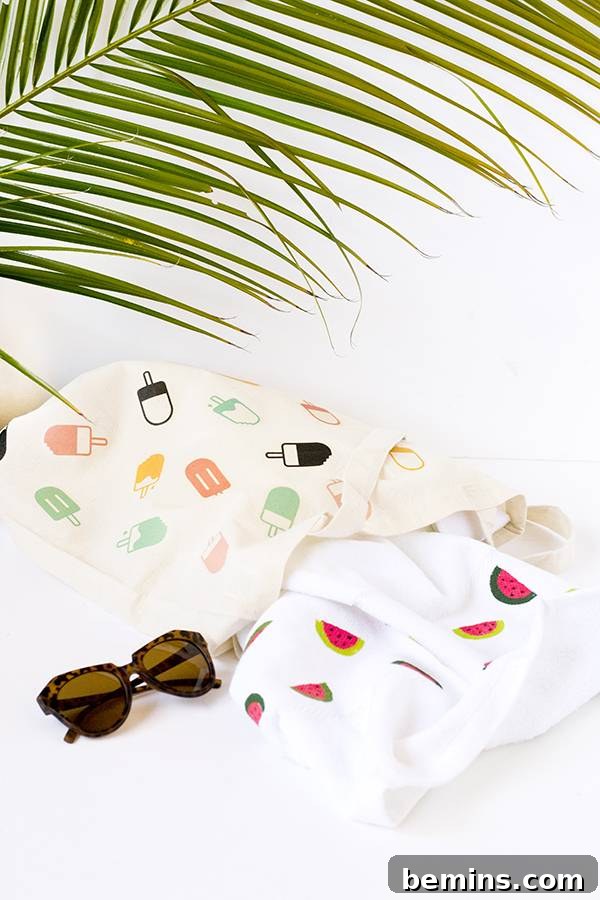 Sunglasses laying on a white table next to towels and a palm tree leaf.