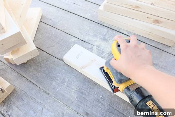 Sanding Lumber for Smooth Finish on Planter