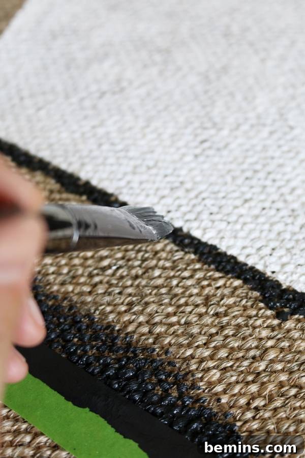 Painting intricate details on a DIY modern outdoor rug