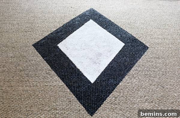 Allowing the DIY outdoor rug to dry overnight for full curing