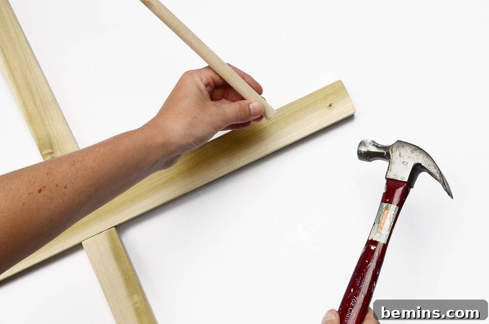 DIY Backyard Ring Toss: A Fun Outdoor Game Project 6 Nailing the Base for Added Stability