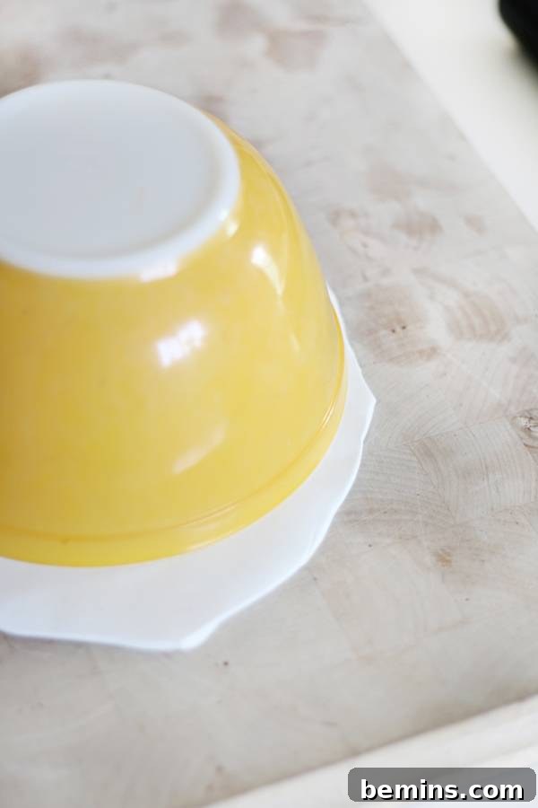 Create Beautiful DIY Hanging Clay Planters 5 Placing an oven-safe bowl over rolled clay