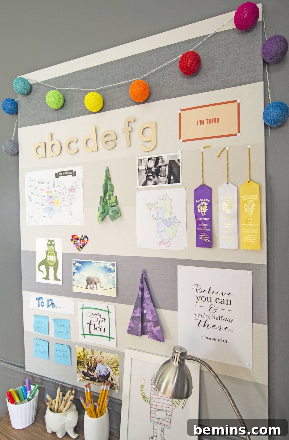 Paper airplanes pinned to the bulletin board as motivation.