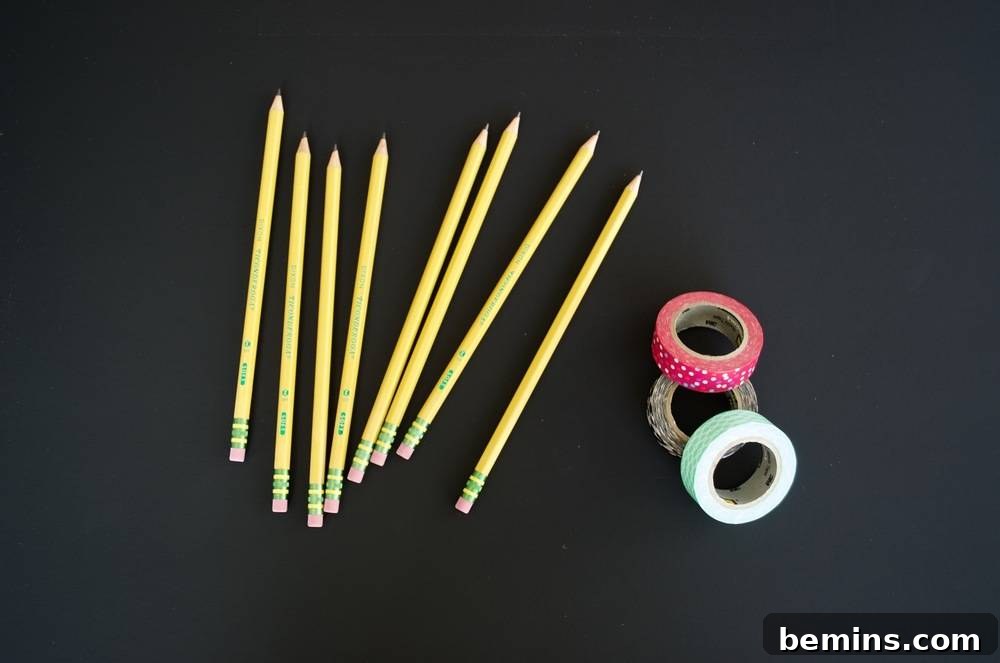 Kid-Friendly DIY: Personalized Pencil Pouches for School 4 Eight sharped pencil erasers and three colored plasters on the black background: Ready for washi tape