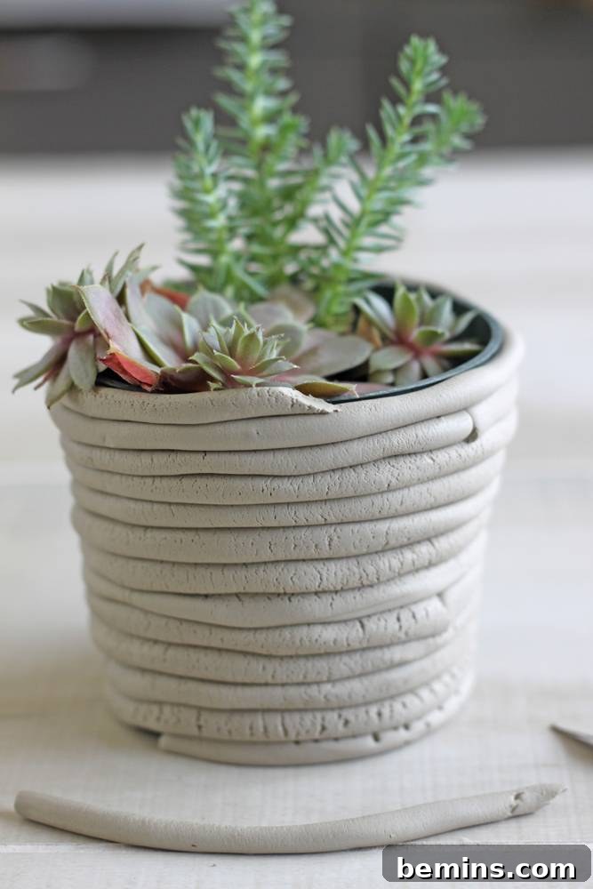 Curiosity Planter: Crafting a Quirky DIY "Bone" Vase 6 Loop the coil all the way up to the top