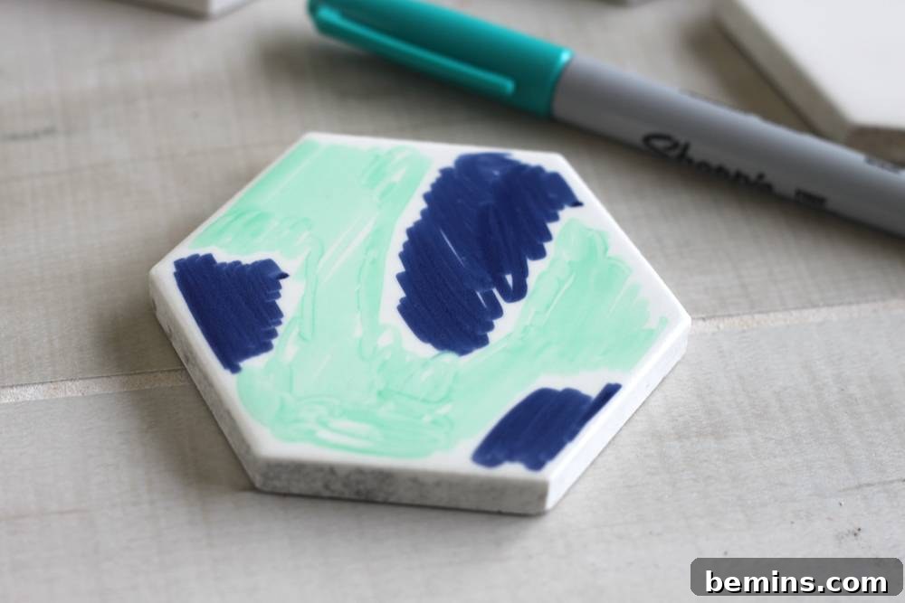 DIY Sharpie Coasters: A Creative Home Decor Project 4 Scribble some shapes on the ceramic tile.