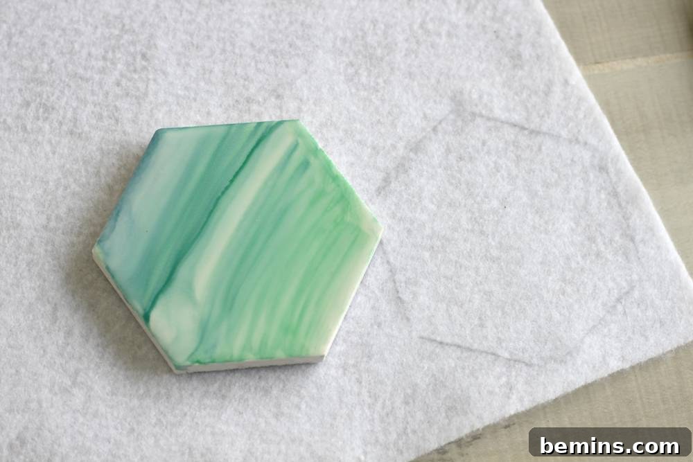 DIY Sharpie Coasters: A Creative Home Decor Project 7 Trace a piece of white felt for the bottom of the coasters.