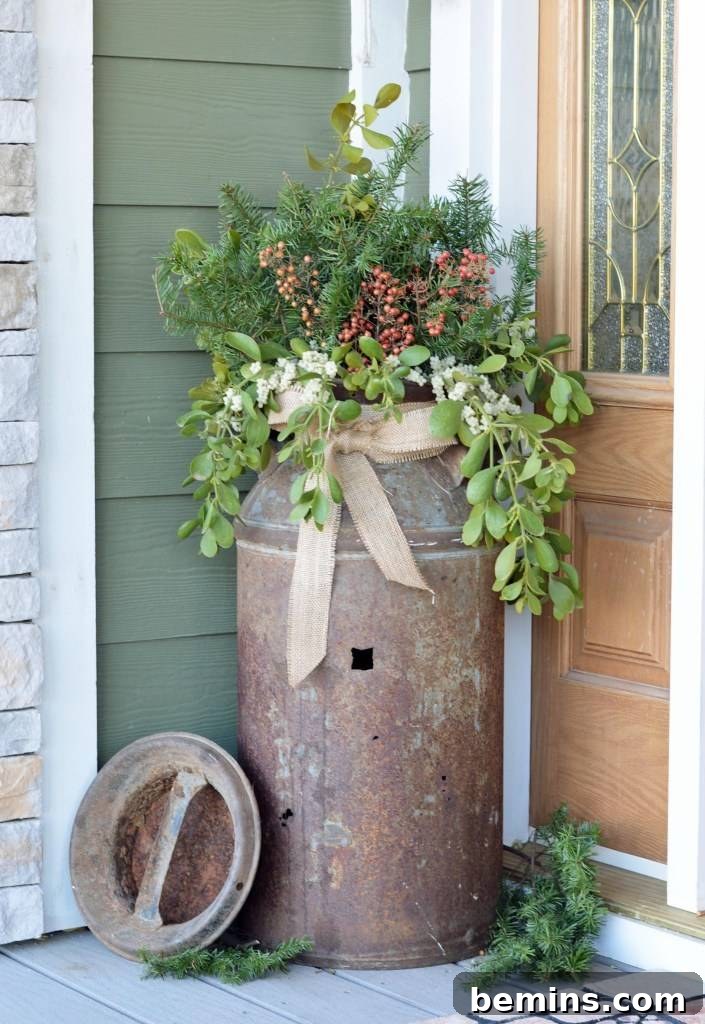 Irresistible Rustic Patio Decor 7 Vintage metal milk can repurposed as a rustic planter with fall foliage