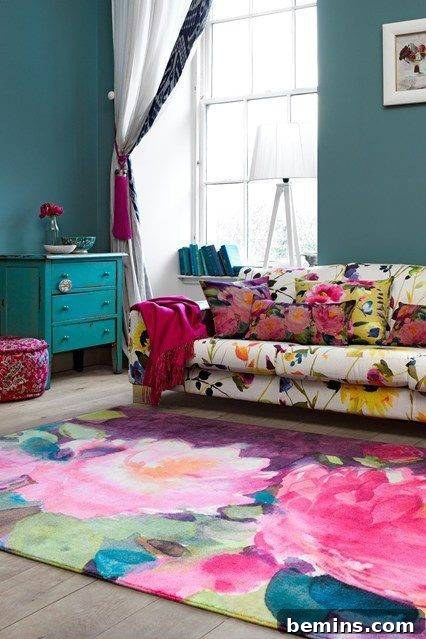 A cozy living room showcasing a beautifully painted watercolor rug placed near a comfortable sofa.