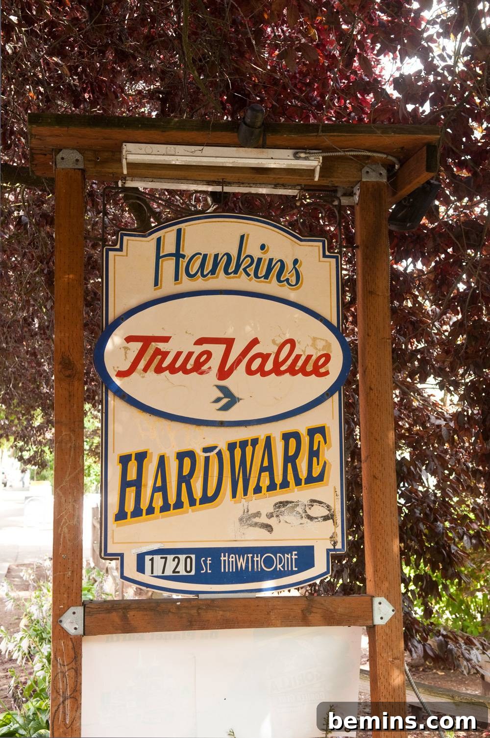 A sign indicating the location of a True Value hardware store.